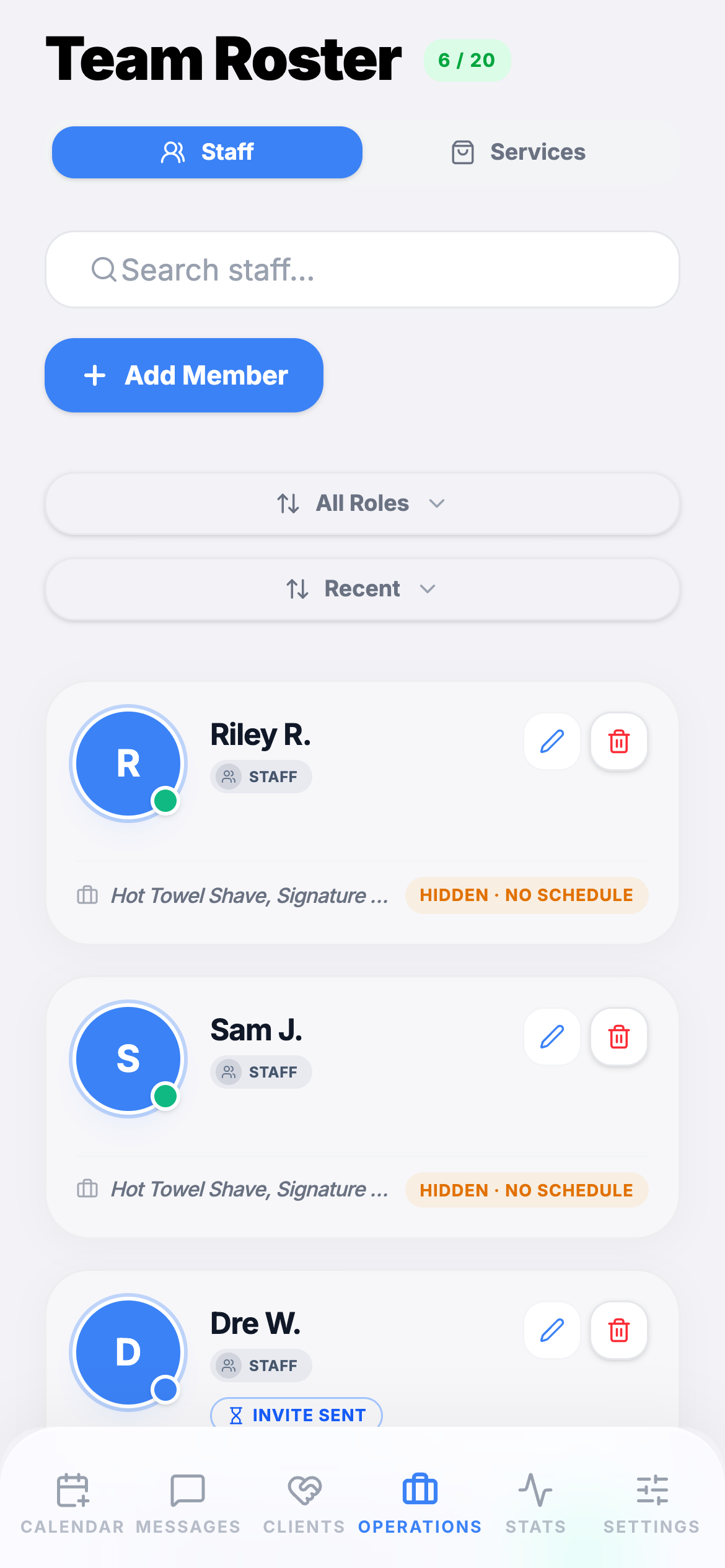The team roster with roles and per-barber services
