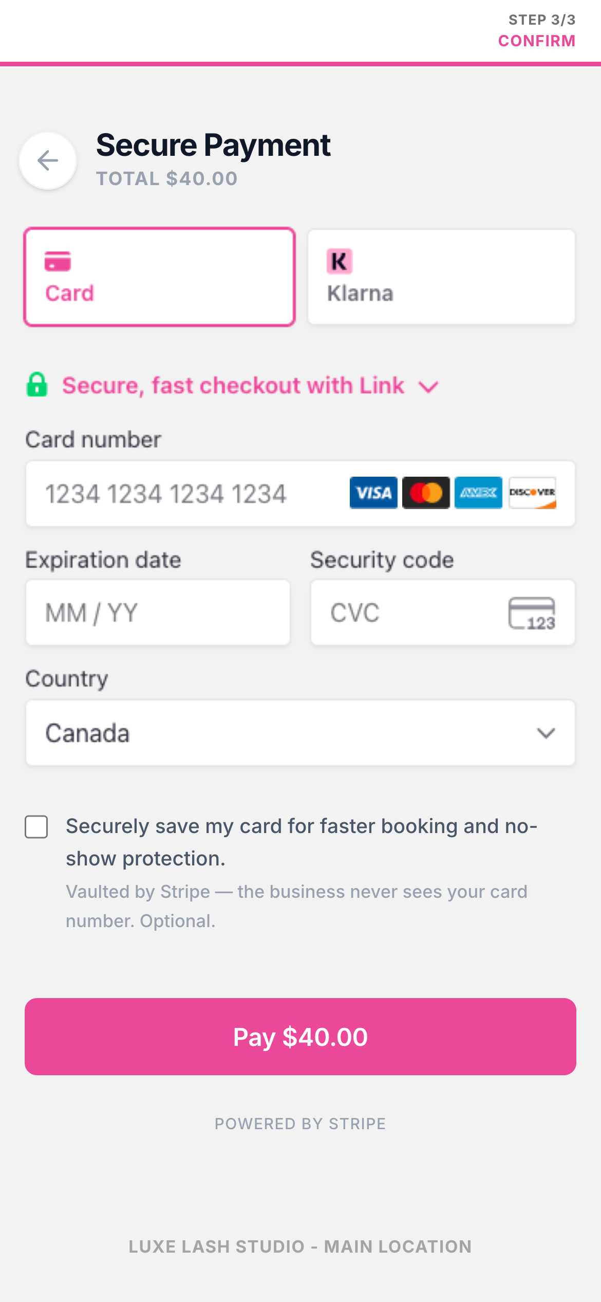 Paying a lash deposit: a white Stripe checkout in the studio pink